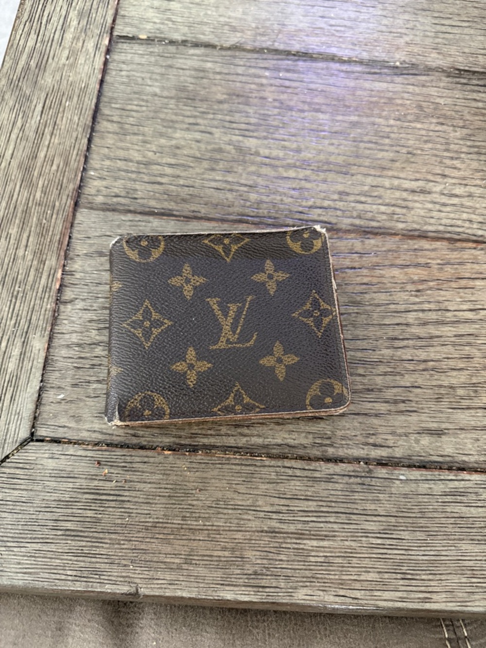 Louis Vuitton Monogram Canvas Bi-Fold Wallet in Brown